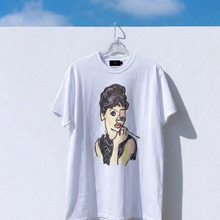Load image into Gallery viewer, White t-shirt with a graphic design of a woman's face on a white background