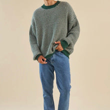 Load image into Gallery viewer, Wearing a green and white checkered sweater with blue jeans 