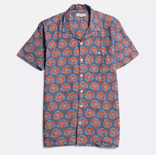 Load image into Gallery viewer, A short-sleeved blue shirt with an orange patch floral print, featuring a convertible collar, left chest pocket, and genuine mother of pearl buttons.