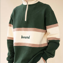 Load image into Gallery viewer, Green and beige striped sweater with 'bound' text on a beige background