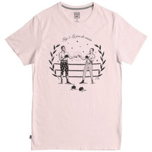 Load image into Gallery viewer, A pink t-shirt with a black and white graphic print of two people shaking hands inside a boxing ring, surrounded by a green wreath.